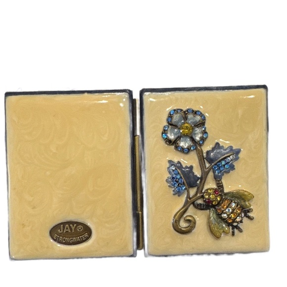 JAY STRONGWATER ENAMELED MINIATURE BIFOLD PICTURE FRAME
NEW
5055 - Picture 4 of 4